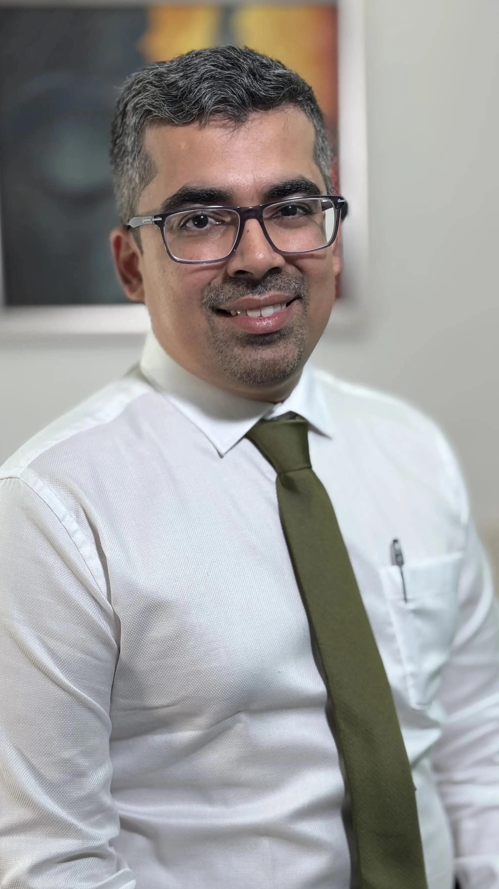 Dr. Vishal Dhanjani, dentist at Sure Smile Dental Clinic